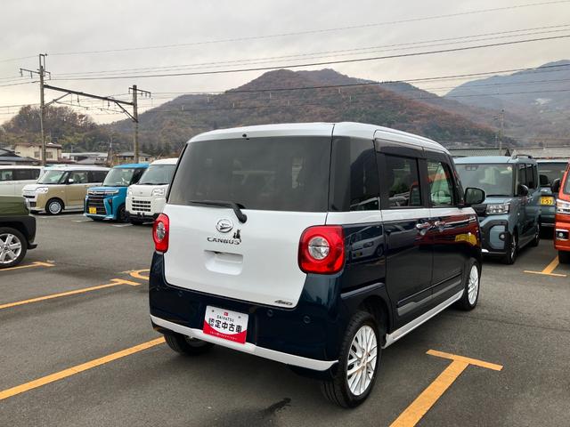 ムーヴキャンバスストライプスGターボ 4WD 10インチナビ1オーナー 4WD スマートキー エアバッグ ターボ ABS キーフリー プッシュ式エンジンスタートボタン 両電動スライドドア オートエアコン(山梨県)の中古車