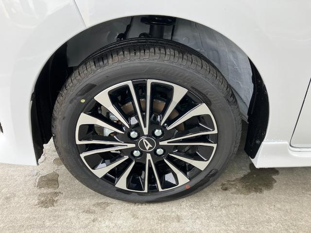 タントカスタムＲＳ　４ＷＤ　純正１０インチナビ　パノラマモニタースマートアシスト・ＬＥＤヘッドライト・１５インチアルミホイール・両側パワースライドドア・ＵＳＢソケット・運転席助手席シートヒーター・レザー調Ｘフルファブリックシート・本革巻ステアリングホイール（山梨県）の中古車