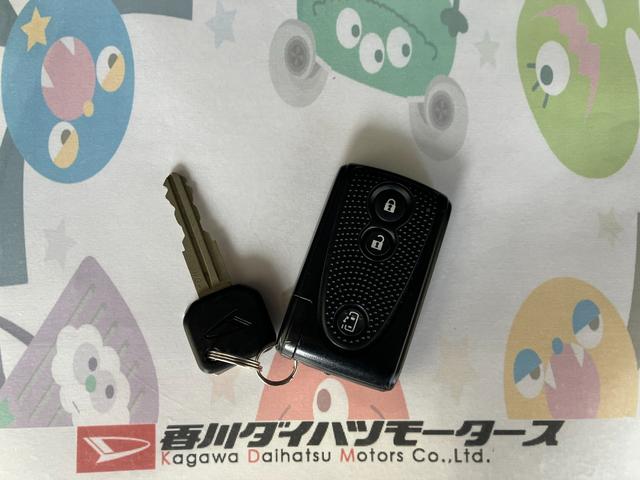 タントカスタムＸスペシャル純正ＥＴＣ　ＴＶ　左側パワースライドドア　純正１４インチアルミホイール　ＨＩＤ　アイドリングストップ　ハロゲンヘッドライト　スマートキー　取扱説明書　メンテナンスノート（香川県）の中古車