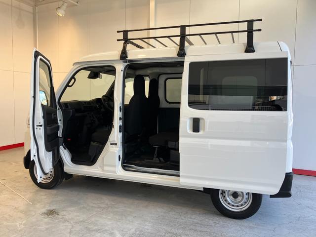 ハイゼットカーゴＤＸ　ＭＴ／ルーフキャリア−ワンオーナー　メーター交換車　ＭＴ　ＡＭ／ＦＭラジオ　両側スライドドア　ルーフキャリア−　キーレスエントリー　取扱説明書　メンテナンスノート（香川県）の中古車