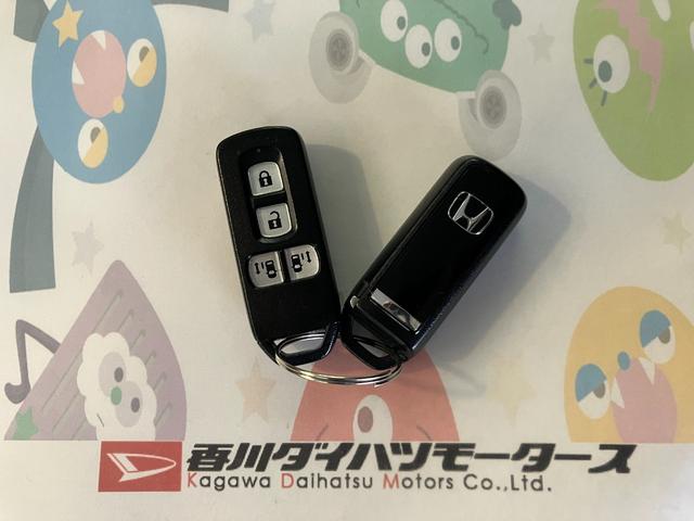 Ｎ−ＢＯＸカスタムＧターボＳＳパッケージ　ナビ　バックモニター純正ナビ　バックモニター　純正ＥＴＣ　純正１５インチアルミホイール　両側パワースライドドア　ＡＣＣ　ターボ　ＨＩＤヘッドランプ　サイド・カーテンシールドエアバッグ　取扱説明書　メンテナンスノート（香川県）の中古車