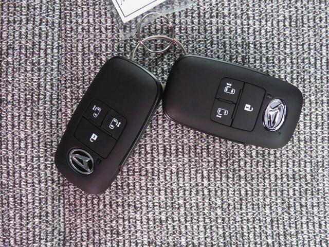 ムーヴキャンバスストライプスG 届出済未使用車 キーフリー 1年間無料保証BLUETOOTH フルセグ USBポート Sヒーター ワンオーナー 電動パーキングブレーキ パノラマカメラ 両側パワースライドドア 9型ディスプレイオーディオ コーナーセンサー オートエアコン(三重県)の中古車