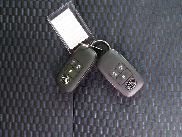 タントカスタムX 届出済未使用車 パワーウィンドウ 1年間無料保証電動パーキングブレーキ コーナーセンサー オートエアコン バックカメラ 1オーナー 展示車 両側パワースライドドア 運転席・助手席シートヒーター キーフリー 電動格納ミラー LEDヘッドライト(三重県)の中古車