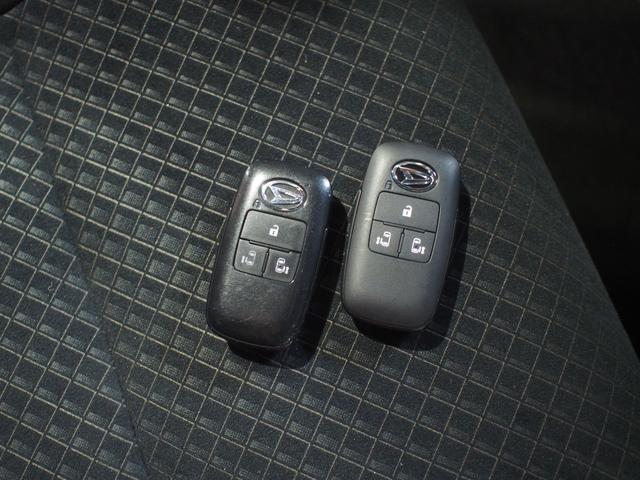 タントカスタムＸ４ＷＤ　スマートアシスト　両側パワースライドドア　ＬＥＤヘッドライト　オートライト　ダイハツ純正ナビ　バックモニター　ナビ連動ドライブレコーダー　運転席助手席シートヒーター　後席テーブル（北海道）の中古車