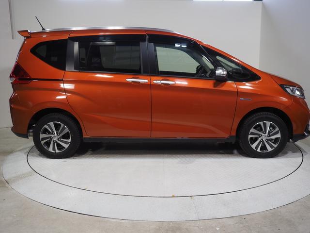 フリード＋ハイブリッドハイブリッド・クロスターホンダセンシング４ＷＤ　夏冬タイヤ　両側パワースライドドア　ホンダ純正ナビ　バックモニター　ドライブレコーダー　ＥＴＣ車載器　運転席助手席シートヒーター　オートエアコン　クルーズコントロール　ＬＥＤヘッドライト（北海道）の中古車