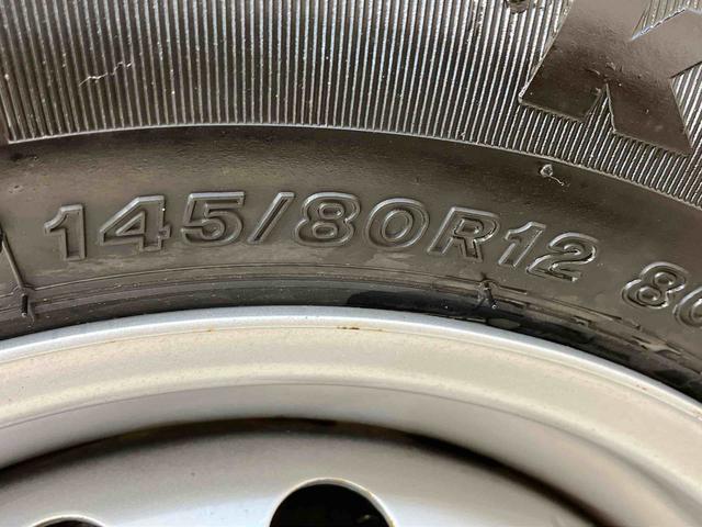 ハイゼットカーゴデラックス５５ｔｈアニバーサリーゴールドエディション４ＷＤ　両側スライドドア　キーレスエントリー　記録簿　ワンオーナー　エアバッグ　エアコン　パワーステアリング　パワーウィンドウ　ＡＢＳ（北海道）の中古車