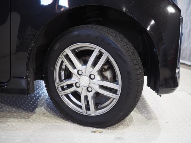 タントカスタムＸ４ＷＤ　両側パワースライドドア　夏冬タイヤ　ダイハツ純正ナビ　バックモニター　リモコンエンジンスターター　ＬＥＤヘッドライト　オートライト　シートヒーター　後席テーブル　アイドリングストップ（北海道）の中古車