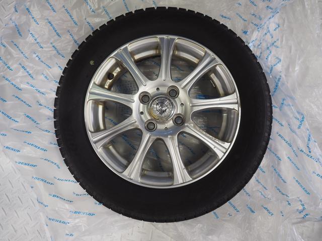 タントカスタムＸ４ＷＤ　夏冬タイヤ　両側スライドドア左電動　カーナビ　リモコンエンジンスターター　キーフリーシステム　オートエアコン　ＬＥＤヘッドライト　オートライト　アルミホイール　アイドリングストップ（北海道）の中古車