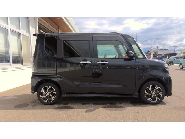 タントカスタムＸ４ＷＤ　両側パワースライドドア　ダイハツ純正ナビ　バックモニター　リモコンエンジンスターター　キーフリーシステム　運転席助手席シートヒーター　前後コーナーセンサー　アイドリングストップ（北海道）の中古車