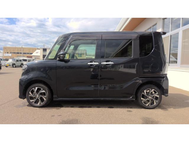 タントカスタムＸ４ＷＤ　両側パワースライドドア　ダイハツ純正ナビ　バックモニター　リモコンエンジンスターター　キーフリーシステム　運転席助手席シートヒーター　前後コーナーセンサー　アイドリングストップ（北海道）の中古車