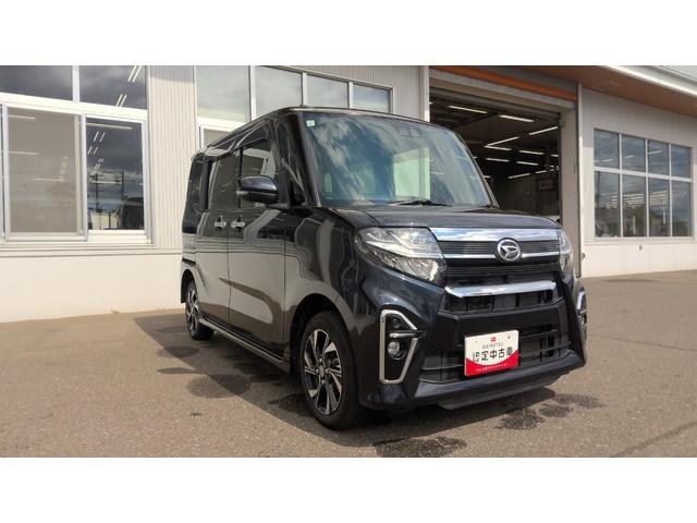 タントカスタムＸ４ＷＤ　両側パワースライドドア　ダイハツ純正ナビ　バックモニター　リモコンエンジンスターター　キーフリーシステム　運転席助手席シートヒーター　前後コーナーセンサー　アイドリングストップ（北海道）の中古車
