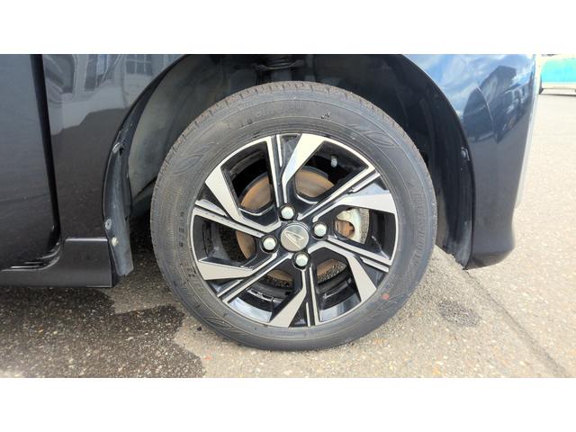 タントカスタムＸ４ＷＤ　両側パワースライドドア　ダイハツ純正ナビ　バックモニター　リモコンエンジンスターター　キーフリーシステム　運転席助手席シートヒーター　前後コーナーセンサー　アイドリングストップ（北海道）の中古車