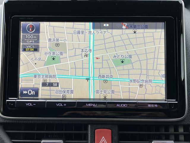 ヴォクシーハイブリッドV 9インチナビ バックカメラ ETC フルセグ保証1年間・距離無制限付き 後席モニター リヤオートエアコン シートヒーター Bluetoothオーディオ DVD再生 CD再生 7人乗りクルーズコントロール スマートキー 電動格納ミラー(東京都)の中古車