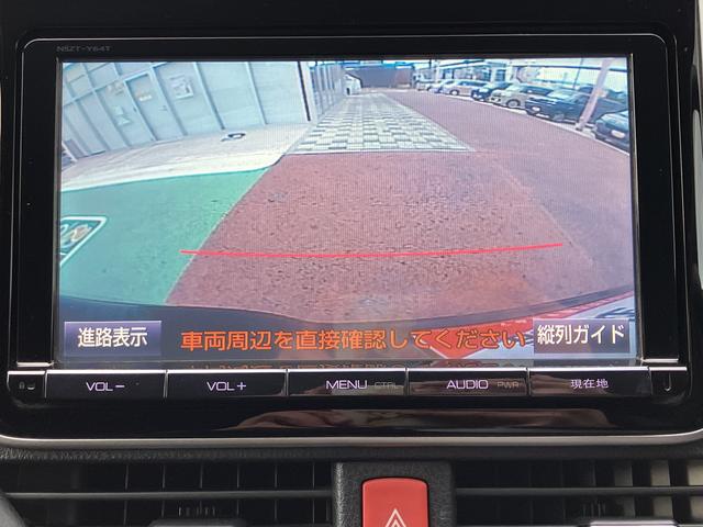 ヴォクシーハイブリッドV 9インチナビ バックカメラ ETC フルセグ保証1年間・距離無制限付き 後席モニター リヤオートエアコン シートヒーター Bluetoothオーディオ DVD再生 CD再生 7人乗りクルーズコントロール スマートキー 電動格納ミラー(東京都)の中古車