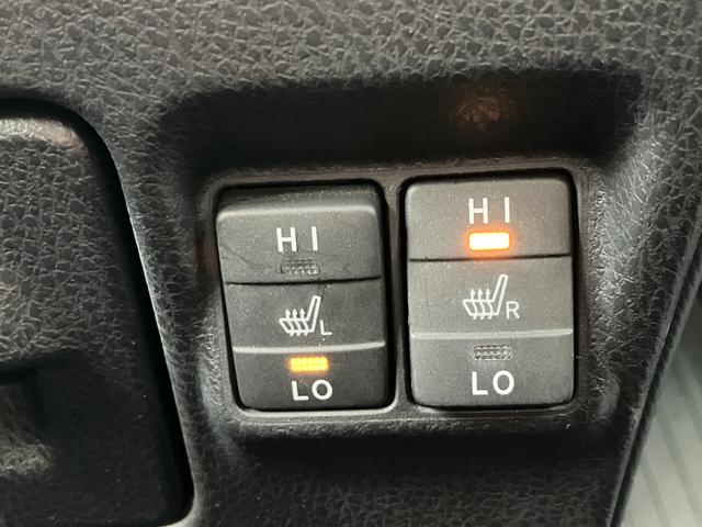 ヴォクシーハイブリッドV 9インチナビ バックカメラ ETC フルセグ保証1年間・距離無制限付き 後席モニター リヤオートエアコン シートヒーター Bluetoothオーディオ DVD再生 CD再生 7人乗りクルーズコントロール スマートキー 電動格納ミラー(東京都)の中古車