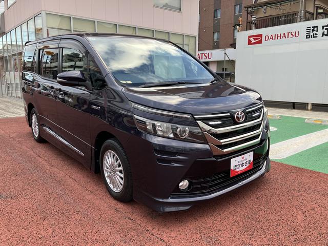 ヴォクシーハイブリッドV 9インチナビ バックカメラ ETC フルセグ保証1年間・距離無制限付き 後席モニター リヤオートエアコン シートヒーター Bluetoothオーディオ DVD再生 CD再生 7人乗りクルーズコントロール スマートキー 電動格納ミラー(東京都)の中古車