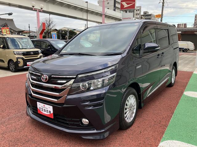 ヴォクシーハイブリッドV 9インチナビ バックカメラ ETC フルセグ保証1年間・距離無制限付き 後席モニター リヤオートエアコン シートヒーター Bluetoothオーディオ DVD再生 CD再生 7人乗りクルーズコントロール スマートキー 電動格納ミラー(東京都)の中古車