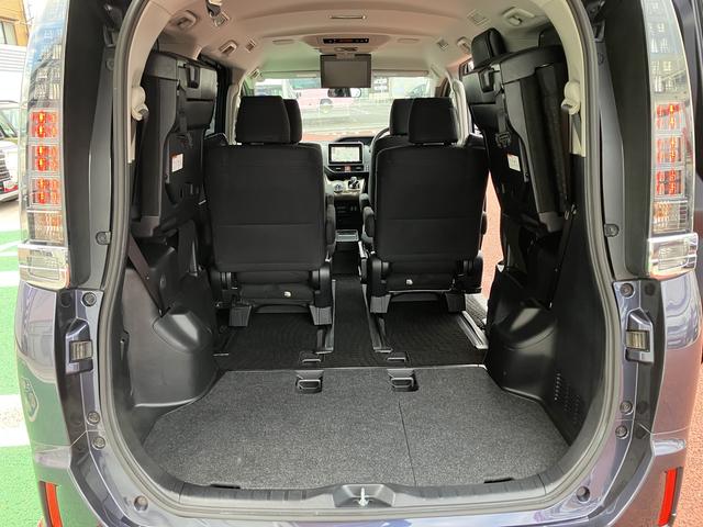 ヴォクシーハイブリッドV 9インチナビ バックカメラ ETC フルセグ保証1年間・距離無制限付き 後席モニター リヤオートエアコン シートヒーター Bluetoothオーディオ DVD再生 CD再生 7人乗りクルーズコントロール スマートキー 電動格納ミラー(東京都)の中古車