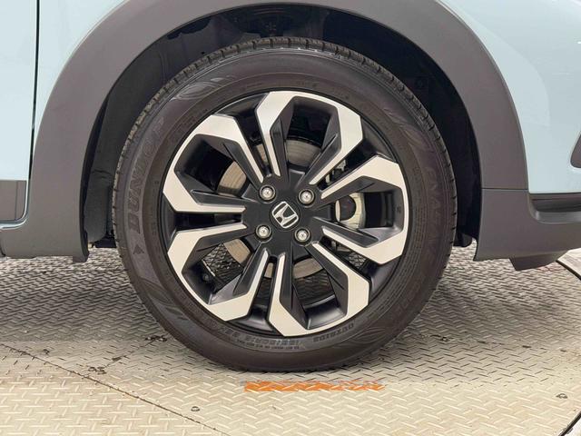 フィットｅ：ＨＥＶクロスター　純正ナビ　バックカメラ　ＥＴＣ２．０保証１年間・距離無制限付き　ＡＣＣ　前後方ドラレコ　前後コーナーセンサー　スマートキー　電動格納ミラー　パワーウィンドウ　ＦＭ／ＡＭラジオ　１６インチアルミホイール（東京都）の中古車