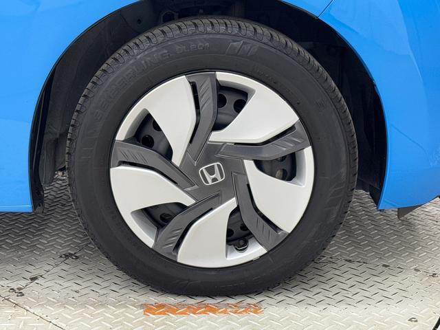 フィットハイブリッドＦパッケージ　７インチナビ　バックカメラ　ＥＴＣ　フルセグ保証１年間・距離無制限付き　ＤＶＤ再生　ＣＤ再生　ＦＭ／ＡＭラジオ　ＬＥＤヘッドライト　オートライト　オートエアコン　ステアリングスイッチ　パワーウィンドウ　電動格納ミラー　スマートキー（東京都）の中古車