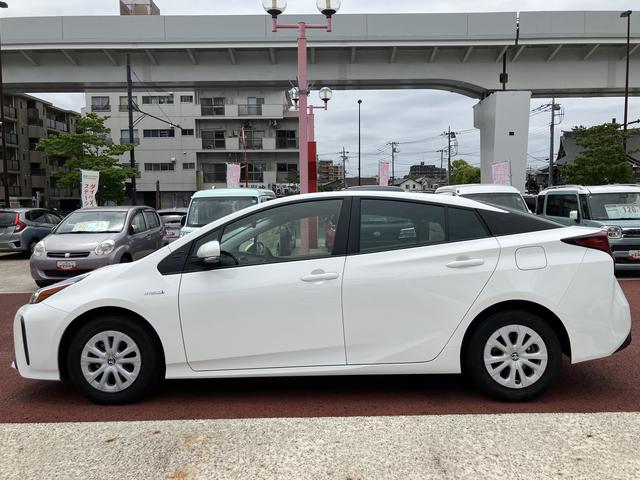 プリウスＥ　純正ナビ　前後コーナーセンサー保証１年間・距離無制限付き　ステアリングスイッチ　ＦＭ／ＡＭラジオ　アダプティブクルーズコントロール　電動格納ミラー　パワーウィンドウ（東京都）の中古車