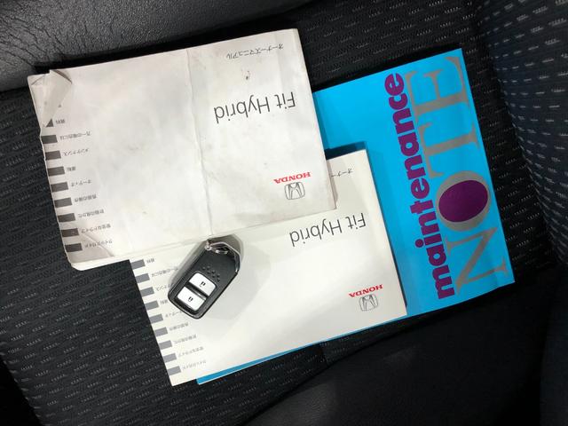 フィットハイブリッドＬパッケージ　フルセグナビ　バックカメラ　フロントカメラ一年保証・走行距離無制限　走行距離５８３８１キロ　フルセグナビ　ブルートゥース　ＤＶＤ再生　バックモニター　フロントモニター　サイドエアバッグ　オートライト　ＬＥＤヘッドランプ（東京都）の中古車