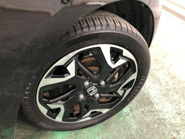 N−BOXカスタムG・EXターボホンダセンシング 走行1.9万キロ/車検整備付一年保証・走行距離無制限 走行19781キロ 純正大画面フルセグナビ バックカメラ ブルートゥース サイドエアバック オートライト LEDヘッドライト ベンチシート 両側電動スライドドア(埼玉県)の中古車