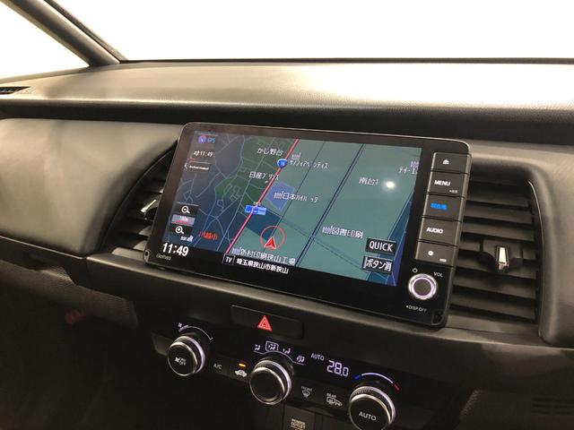 フィットｅ：ＨＥＶホーム走行２１１６４キロ／ナビドラレコ／バックカメ一年保証・走行距離無制限　走行２１１６４キロ　助手席エアバック　ＥＴＣ　純正カーペットマット　フルセグナビ　ブルートゥース　バックカメラ　ドラレコ　クリアランスソナー　オートライト　ＬＥＤヘッドライト（埼玉県）の中古車