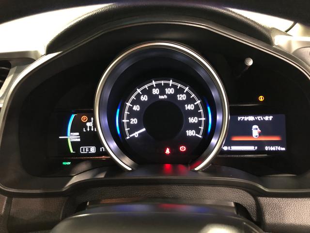 フィットハイブリッドＦ　走行１６６７４キロ／ナビ／バックカメラ／ＥＴＣ一年保証・走行距離無制限　走行１６６７４キロ　ワンセグナビ　ブルートゥース　バックカメラ　オートライト　ＬＥＤヘッドライト　ＥＴＣ（埼玉県）の中古車