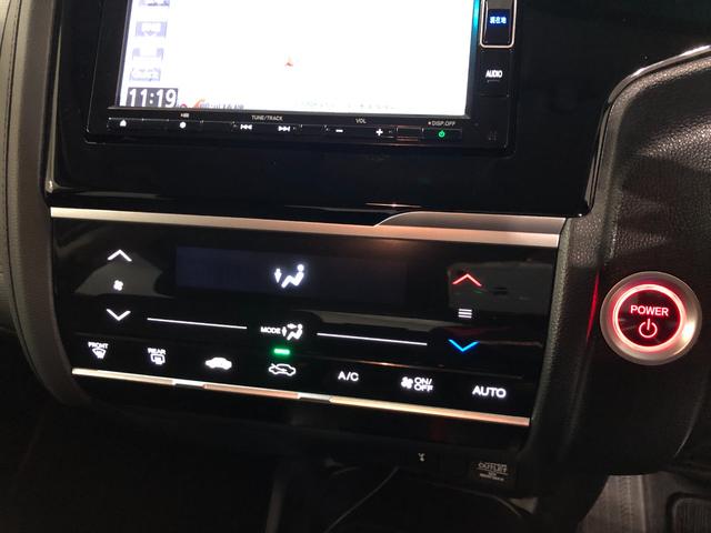 フィットハイブリッドＦ　走行１６６７４キロ／ナビ／バックカメラ／ＥＴＣ一年保証・走行距離無制限　走行１６６７４キロ　ワンセグナビ　ブルートゥース　バックカメラ　オートライト　ＬＥＤヘッドライト　ＥＴＣ（埼玉県）の中古車