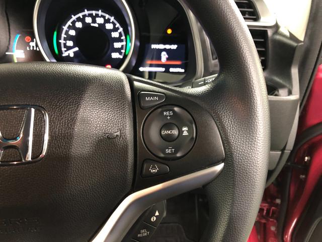 フィットハイブリッドＦ　走行１６６７４キロ／ナビ／バックカメラ／ＥＴＣ一年保証・走行距離無制限　走行１６６７４キロ　ワンセグナビ　ブルートゥース　バックカメラ　オートライト　ＬＥＤヘッドライト　ＥＴＣ（埼玉県）の中古車