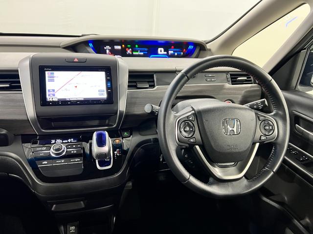 フリードハイブリッドハイブリッド・Ｇホンダセンシング　走行３４４２０キロ一年保証・走行距離無制限走行３４４２０キロ　車検整備付　フルセグナビ　ドラレコ　ＥＴＣ　オートライト　ＬＥＤヘッドライト　両側電動スライドドア（埼玉県）の中古車