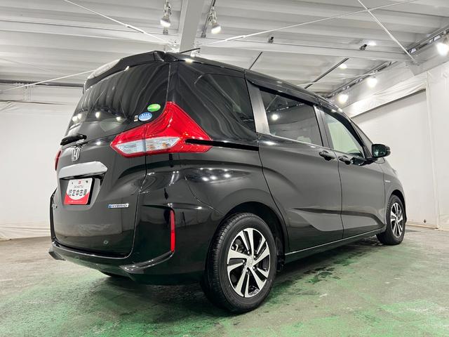 フリードハイブリッドハイブリッド・Ｇホンダセンシング　走行３４４２０キロ一年保証・走行距離無制限走行３４４２０キロ　車検整備付　フルセグナビ　ドラレコ　ＥＴＣ　オートライト　ＬＥＤヘッドライト　両側電動スライドドア（埼玉県）の中古車