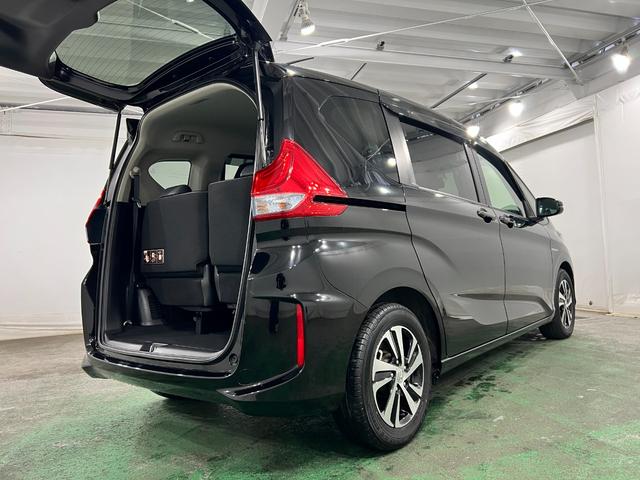 フリードハイブリッドハイブリッド・Ｇホンダセンシング　走行３４４２０キロ一年保証・走行距離無制限走行３４４２０キロ　車検整備付　フルセグナビ　ドラレコ　ＥＴＣ　オートライト　ＬＥＤヘッドライト　両側電動スライドドア（埼玉県）の中古車