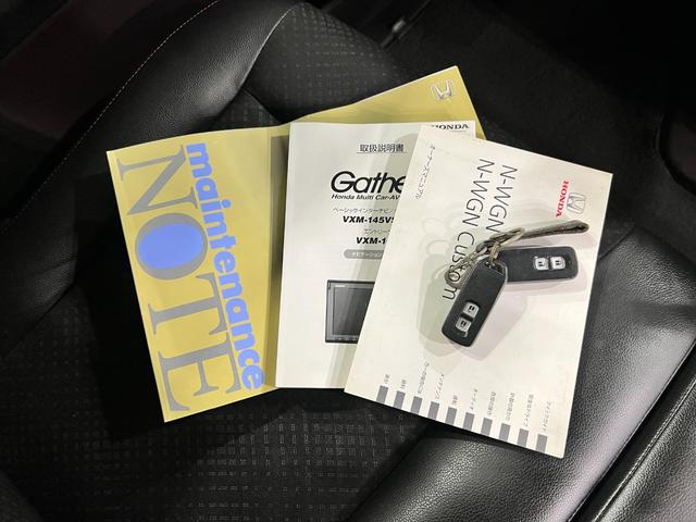 Ｎ−ＷＧＮカスタムＧ・Ａパッケージ　走行６２６５５キロ／ナビ／バックカメラ一年保証・走行距離無制限走行６２６５５キロ　ワンセグナビ　ブルートゥース　バックカメラ　サイドエアバック　オートライト　ＨＩＤ　ベンチシート（埼玉県）の中古車