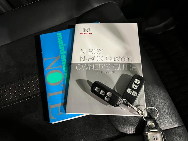 N−BOXカスタムG・Lターボホンダセンシング 雹害/走行27988キロ/ナビ1年保証距離無制限 走行距離27988キロ フルセグナビ バックカメラ ブルートゥース 純正マット サイドエアバッグ オートライト 両側電動スライドドア 電動格納式ドアミラー(埼玉県)の中古車