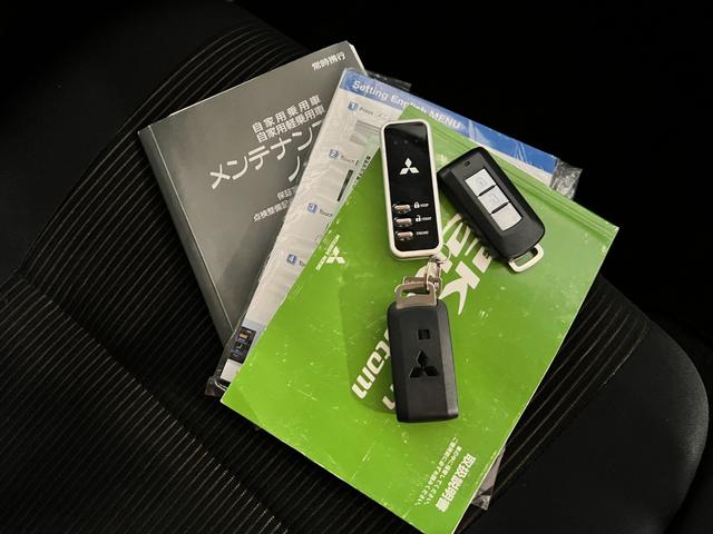 eKカスタムT 走行69766キロ/ナビ/ETC/バックカメラ一年保証・走行距離無制限 フルセグナビ ETC オートライト HIDヘッドライト ベンチシート オールシーズンタイヤ バックカメラ(埼玉県)の中古車