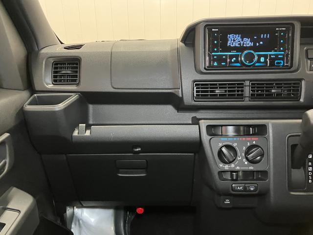 ハイゼットカーゴDX BluetoothチューナーサポカーSワイド適合 Bluetoothチューナー エアコン アクセサリーソケット コーナーセンサー アイドリングストップ 光軸調整ダイヤル 横滑り防止機能 誤発進抑制機能 パワーウインドウ キーレス(神奈川県)の中古車