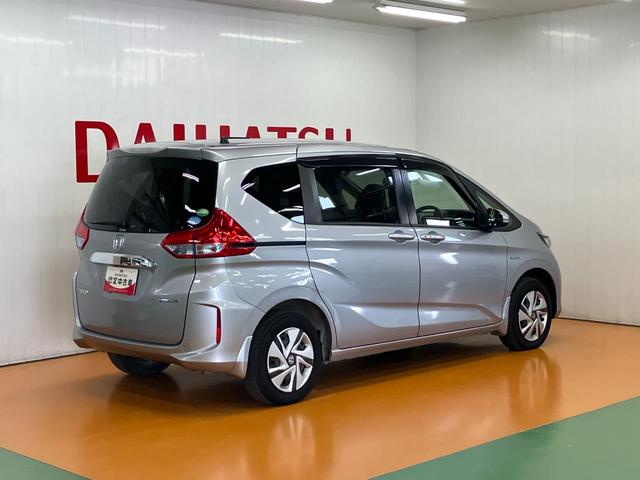 フリードハイブリッドハイブリッド・Ｇホンダセンシングハイブリッド　衝突被害軽減ブレーキシステム　後席モニター　ステアリングスイッチ　クルーズコントロール　シートヒーター　Ｐスタート　アクセサリーソケット　両側オートスライドドア　レーンアシスト　ＥＴＣ（神奈川県）の中古車