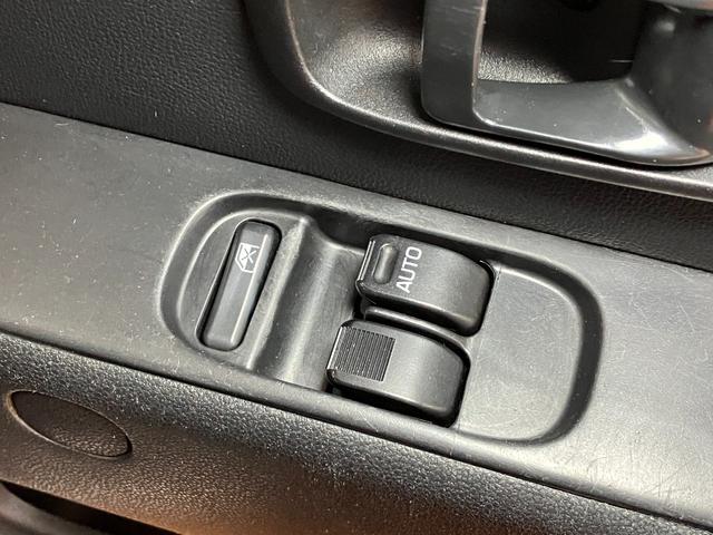 ハイゼットカーゴクルーズ雹害車　４ＷＤ　５ＭＴ　両側スライドドア　Ｂカメラ　ナビ　エアコン　アイドリングストップ　電動格納ミラー　パワーウインドウ　ＥＴＣ　スタッドレスタイヤ　キーレス（神奈川県）の中古車