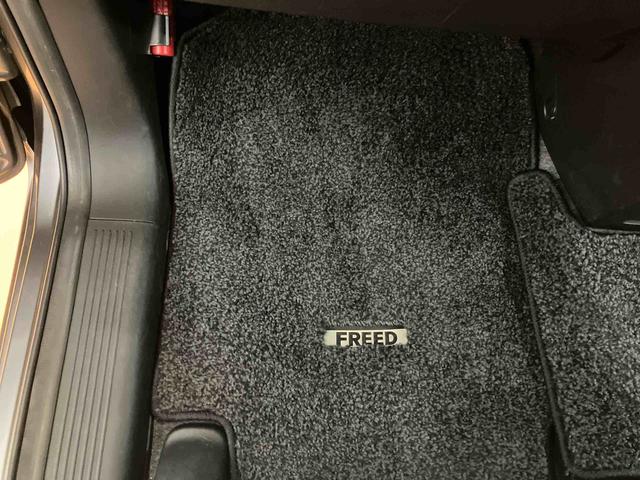 フリードＧ　エアロバックカメラ連動ワンセグナビ　ビデオ入力ソケット　後席モニター　ビルトインＥＴＣ　左側電動スライドドア　アイドリングストップ機構　オートライト　バニティーミラー付き左右サンバイザー（千葉県）の中古車