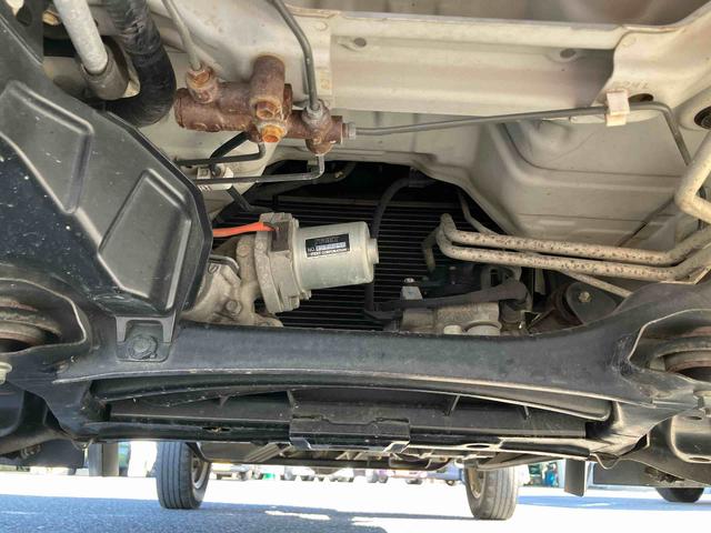 キャリイトラック頑丈ダンプ4WD ダンプ 荷台三方開 4枚リーフスプリング ETC マニュアルシフト 社外アルミホイール AM/FMラジオ マニュアルエアコン バッテリーカバー サイドレバー式パーキングブレーキ パワステ(千葉県)の中古車