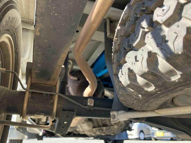 キャリイトラック頑丈ダンプ4WD ダンプ 荷台三方開 4枚リーフスプリング ETC マニュアルシフト 社外アルミホイール AM/FMラジオ マニュアルエアコン バッテリーカバー サイドレバー式パーキングブレーキ パワステ(千葉県)の中古車