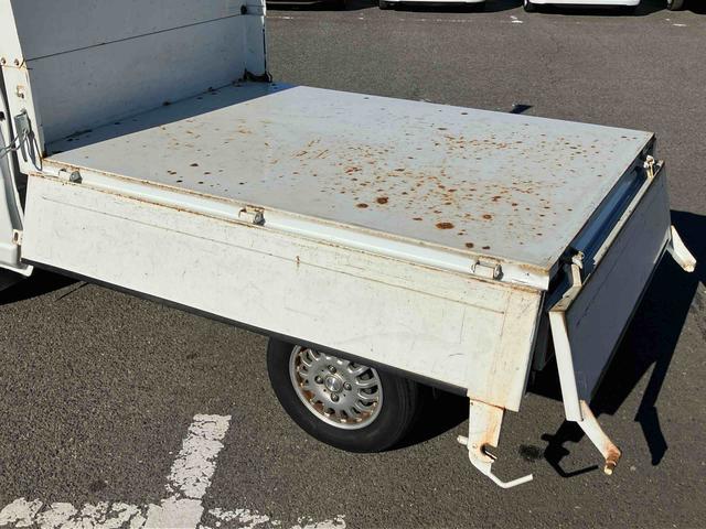 キャリイトラック頑丈ダンプ4WD ダンプ 荷台三方開 4枚リーフスプリング ETC マニュアルシフト 社外アルミホイール AM/FMラジオ マニュアルエアコン バッテリーカバー サイドレバー式パーキングブレーキ パワステ(千葉県)の中古車