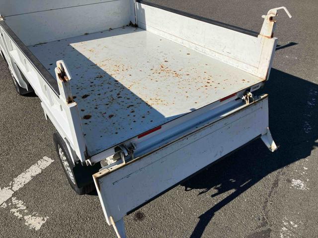 キャリイトラック頑丈ダンプ4WD ダンプ 荷台三方開 4枚リーフスプリング ETC マニュアルシフト 社外アルミホイール AM/FMラジオ マニュアルエアコン バッテリーカバー サイドレバー式パーキングブレーキ パワステ(千葉県)の中古車