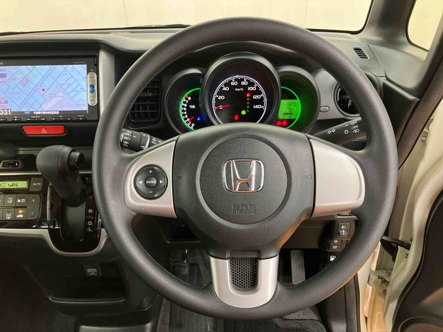 Ｎ−ＢＯＸＧ・Ｌパッケージバックカメラ連動ワンセグナビ　ブルートゥース対応　左側電動スライドドア　　チルトステアリング　運転席シートリフタ　バニティーミラー付き左右サンバイザー　助手席シートバックポケット＋ショッピングフック（千葉県）の中古車