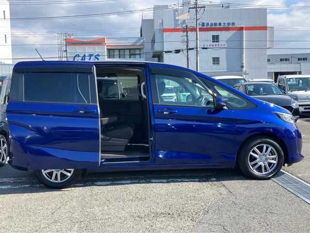 フリードＧ・ホンダセンシング９型ナビ／ＴＶ／ＤＶＤ／ＢＴ　バックカメラ　ＥＴＣ　全車速追従クルコン　オートライト　トップシェイドガラス　アルミホイール　両側電動スライド　衝突軽減ブレーキ　オートエアコン　イモビライザー　ステリモ（千葉県）の中古車