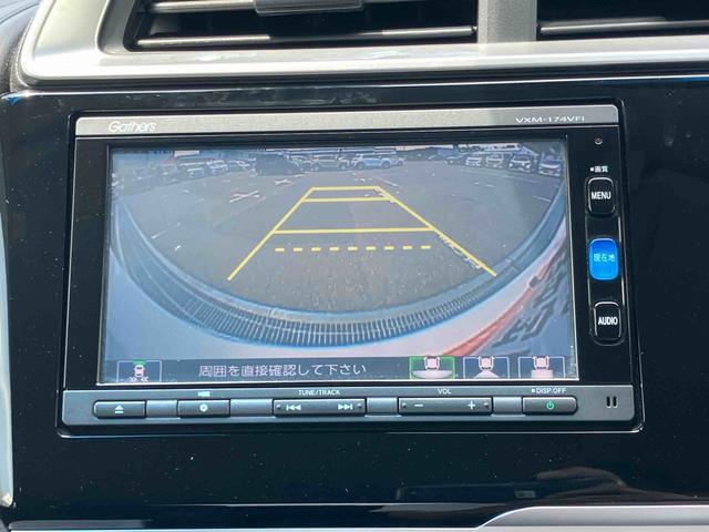 フィットハイブリッド 中古車 Ｌパッケージハイブリッド　ナビ／ＴＶ／ＤＶＤ／ＢＴ　バックカメラ　ＥＴＣ　ＬＥＤヘッドライト　オートライト　オートクルーズ　ハーフシェイドガラス　革巻ハンドル　サイドレバー式駐車ブレーキ　衝突軽減装置　ステリモ
