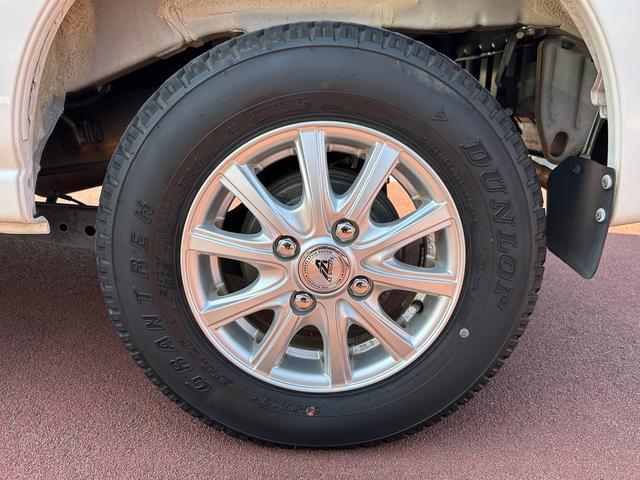 ハイゼットカーゴクルーズ　７インチナビ　電動格納ドアミラー　バックカメラ保証１年間距離無制限付き・ワンセグナビ・電動格納ドアミラー・キーレス・バックカメラ・リヤベンチシート・前席パワーウインドウ（東京都）の中古車