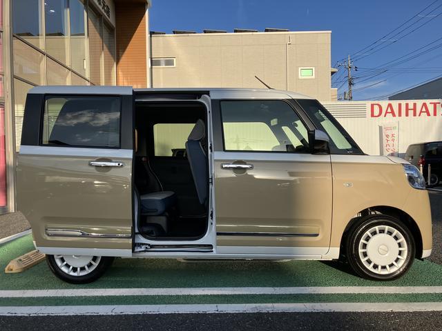 ムーヴキャンバスストライプスＧ　フロントシートヒーター　ツートンカラー中古車保証・距離無制限、１年付き　純正ＣＤチューナー　フロントシートヒーター　両側電動スライドドア　ホールド機能付き電動サイドブレーキ　ＬＥＤヘッドライト　ほっとカップホルダー　コーナーセンサー（東京都）の中古車